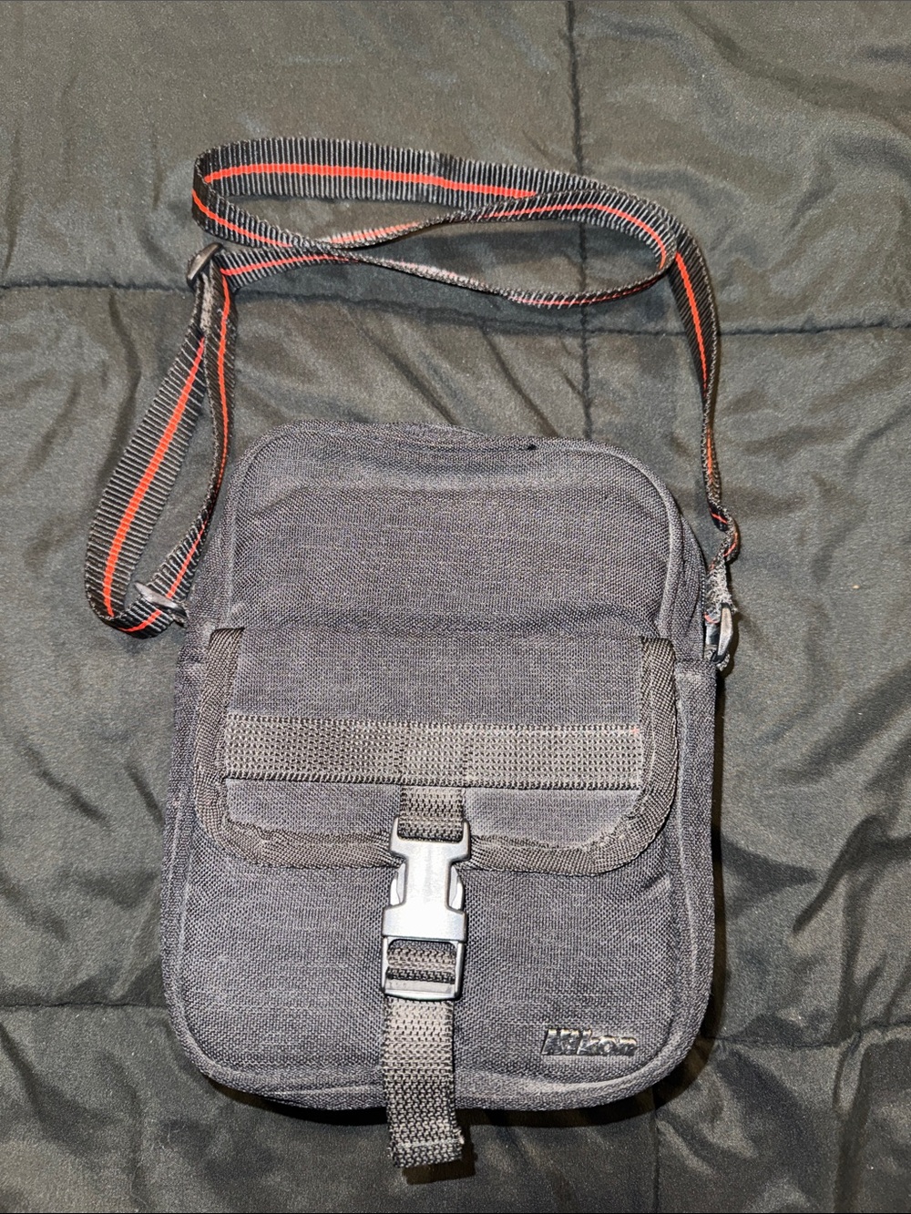 Nikon Black Messenger Crossbody Bag with Red-Trim Strap